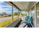 Relaxing screened porch with patio furniture at 1108 43Rd Avenue E Dr, Ellenton, FL 34222