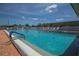 Refreshing community swimming pool with brick deck at 1108 43Rd Avenue E Dr, Ellenton, FL 34222