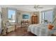 Guest bedroom with two twin beds and city views at 1111 N Gulfstream Ave # 14C, Sarasota, FL 34236