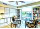 Quiet library with comfortable seating and pool view at 1111 N Gulfstream Ave # 14C, Sarasota, FL 34236