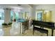 Lobby featuring a piano and stylish decor at 1111 N Gulfstream Ave # 14C, Sarasota, FL 34236