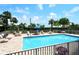 Refreshing pool area with plenty of lounge chairs at 1111 N Gulfstream Ave # 14C, Sarasota, FL 34236