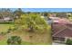 Aerial view showing house and large backyard with tree at 121 Van Dyck Dr # Dr, Nokomis, FL 34275