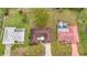 Aerial view of three homes in a neighborhood at 121 Van Dyck Dr # Dr, Nokomis, FL 34275