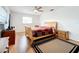 Bedroom with wood floors, ceiling fan, and window at 121 Van Dyck Dr # Dr, Nokomis, FL 34275