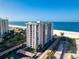 Beachfront condo building with parking and ocean views at 1212 Benjamin Franklin Dr # 305, Sarasota, FL 34236