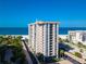 Oceanfront building, featuring balconies and stunning ocean views at 1212 Benjamin Franklin Dr # 305, Sarasota, FL 34236