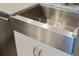 Farmhouse-style stainless steel kitchen sink at 1212 Benjamin Franklin Dr # 305, Sarasota, FL 34236