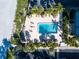 Elevated view of refreshing pool area next to beach at 1212 Benjamin Franklin Dr # 305, Sarasota, FL 34236