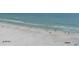 Peaceful beach scene with clear water perfect for swimming at 1260 Dolphin Bay Way # 303, Sarasota, FL 34242