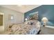 Guest bedroom with coastal decor and comfortable bed at 1260 Dolphin Bay Way # 303, Sarasota, FL 34242