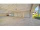 Covered parking garage with multiple spaces at 1260 Dolphin Bay Way # 303, Sarasota, FL 34242