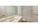 Clean bathroom with a tub, shower, and modern vanity at 12649 Palatka Dr, Venice, FL 34293