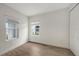 Well-lit bedroom featuring tile floors and a window at 12649 Palatka Dr, Venice, FL 34293