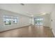 Bright living room featuring tile floors and sliding glass doors at 12649 Palatka Dr, Venice, FL 34293