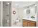 Clean bathroom with shower, toilet and vanity at 1280 Dolphin Bay Way # 202, Sarasota, FL 34242