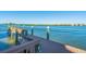 Private dock with bench overlooking the water at 1280 Dolphin Bay Way # 202, Sarasota, FL 34242