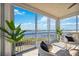 Relaxing sunroom offering stunning water views at 1280 Dolphin Bay Way # 202, Sarasota, FL 34242