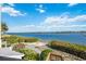 Scenic waterfront view with private beach access at 1280 Dolphin Bay Way # 202, Sarasota, FL 34242