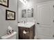 Small bathroom with single vanity and neutral decor at 12915 True Blue Cir, Bradenton, FL 34211