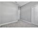 Spacious bedroom with gray walls and carpeting at 12915 True Blue Cir, Bradenton, FL 34211