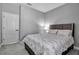 Bedroom with double bed, gray walls, and carpeting at 12915 True Blue Cir, Bradenton, FL 34211