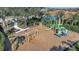 Community playground with swings, slides, and play structures at 12915 True Blue Cir, Bradenton, FL 34211