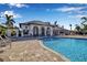 Inviting pool area with surrounding lounge chairs at 12915 True Blue Cir, Bradenton, FL 34211