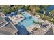 Community pool with lounge chairs and a spa at 12915 True Blue Cir, Bradenton, FL 34211