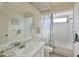 Clean bathroom with a bathtub, toilet and sink at 1314 64Th W St, Bradenton, FL 34209