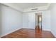 Spacious bedroom with hardwood floors and access to bathroom at 1350 Main St # 1302, Sarasota, FL 34236