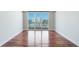 Bright bedroom with hardwood floors and large windows at 1350 Main St # 1302, Sarasota, FL 34236