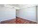 Spacious bedroom with hardwood floors and neutral walls at 1350 Main St # 1302, Sarasota, FL 34236