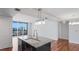 Modern kitchen with granite countertops and stainless steel appliances at 1350 Main St # 1302, Sarasota, FL 34236