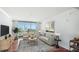 Bright living room with hardwood floors and city views at 1350 Main St # 1302, Sarasota, FL 34236