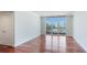 Bright living room with hardwood floors and city views at 1350 Main St # 1302, Sarasota, FL 34236