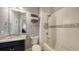 Clean bathroom with tub, shower, and granite countertop at 13947 Messina Loop, Bradenton, FL 34211