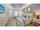 Main bedroom with bay window, tray ceiling, and ample dresser space at 13947 Messina Loop, Bradenton, FL 34211