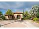 Elegant community clubhouse with palm trees and a welcoming entrance at 13947 Messina Loop, Bradenton, FL 34211