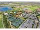 Aerial of community amenities including tennis courts and clubhouse at 13947 Messina Loop, Bradenton, FL 34211