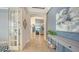 Bright foyer with gray walls and view to living room at 13947 Messina Loop, Bradenton, FL 34211