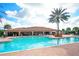 Large resort-style pool with plenty of lounge chairs at 13947 Messina Loop, Bradenton, FL 34211