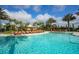 Large resort-style pool with plenty of lounge chairs for relaxing at 13947 Messina Loop, Bradenton, FL 34211