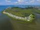 Aerial view of community with waterfront access and lush landscaping at 16 Tidy Island Blvd # 16, Bradenton, FL 34210