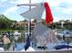 Charming marina with docked boats and whimsical pelican decor at 1621 Clower Creek Dr # Tr173, Sarasota, FL 34231