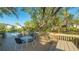 Enjoyable pool deck with table and chairs, overlooking the pool at 1621 Clower Creek Dr # Tr173, Sarasota, FL 34231