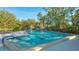 Refreshing swimming pool with plenty of lounge chairs at 1621 Clower Creek Dr # Tr173, Sarasota, FL 34231