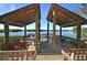 Enjoy waterfront views from this covered deck with seating at 1621 Clower Creek Dr # Tr173, Sarasota, FL 34231