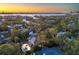 Aerial view of house and neighborhood at sunset at 1718 Prospect St, Sarasota, FL 34239