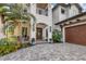 Elegant home entrance with a paved walkway at 1718 Prospect St, Sarasota, FL 34239